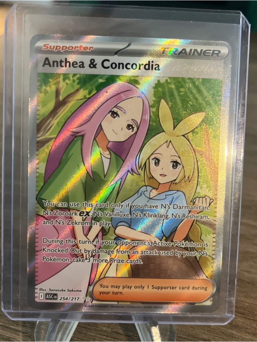 Pokemon Anthea & Concordia Holographic Trainer Card - Pink, Green, Yellow